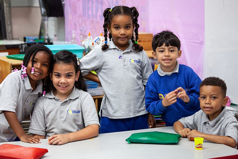 Scholarship students working together in a Fairfield County Catholic school classroom