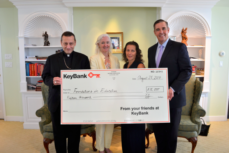 Foundations in Education Receiving Giant Check from KeyBank